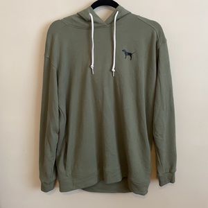 Green oversized pink hoodie with pockets.